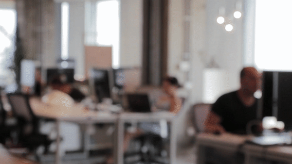 People working at desks in an office